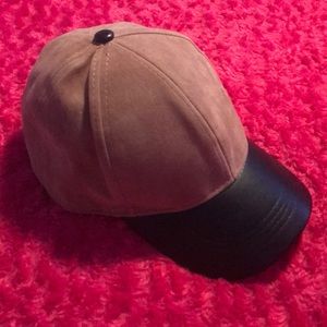 camel suede and black leather hat